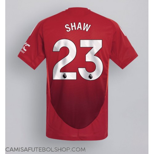 Camisa de time de futebol Manchester United Luke Shaw #23 Replicas 1º Equipamento 2024-25 Manga Curta